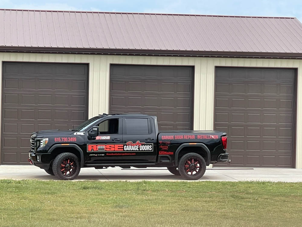Image of Modern Brown Commercial Sectional Garage Doors by Rose Quality Garage Doors Serving Murfreesboro, Nashville, Knoxville, Clarksville, and Franklin, TN locations.