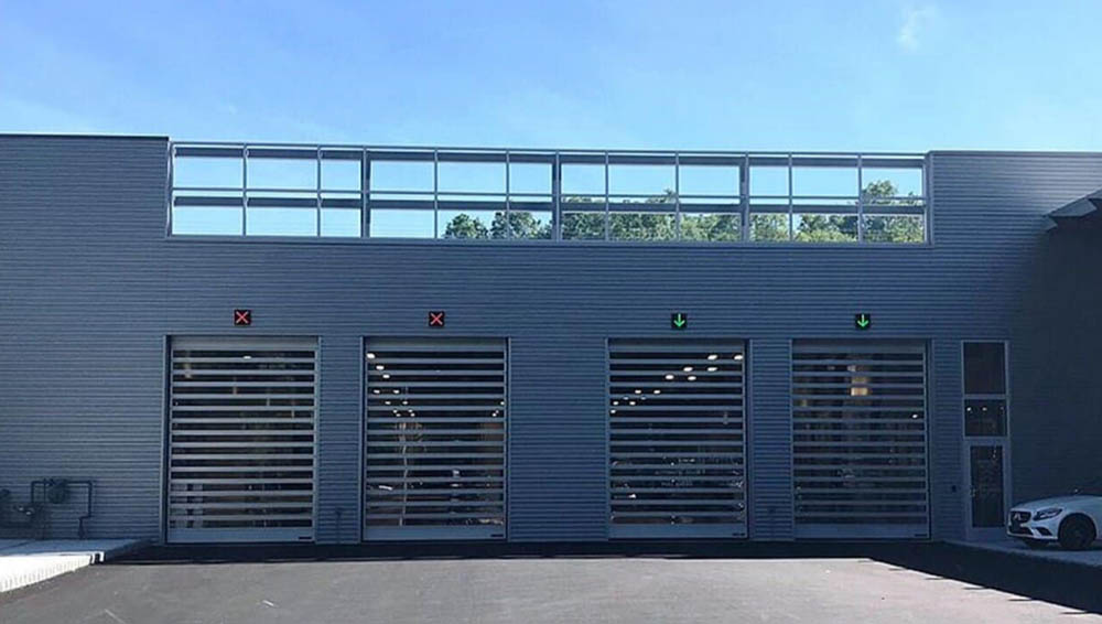 Image of Modern Grey Commercial High-Speed Steel Garage Doors by Rose Quality Garage Doors Serving Murfreesboro, Nashville, Knoxville, Clarksville, and Franklin, TN locations.
