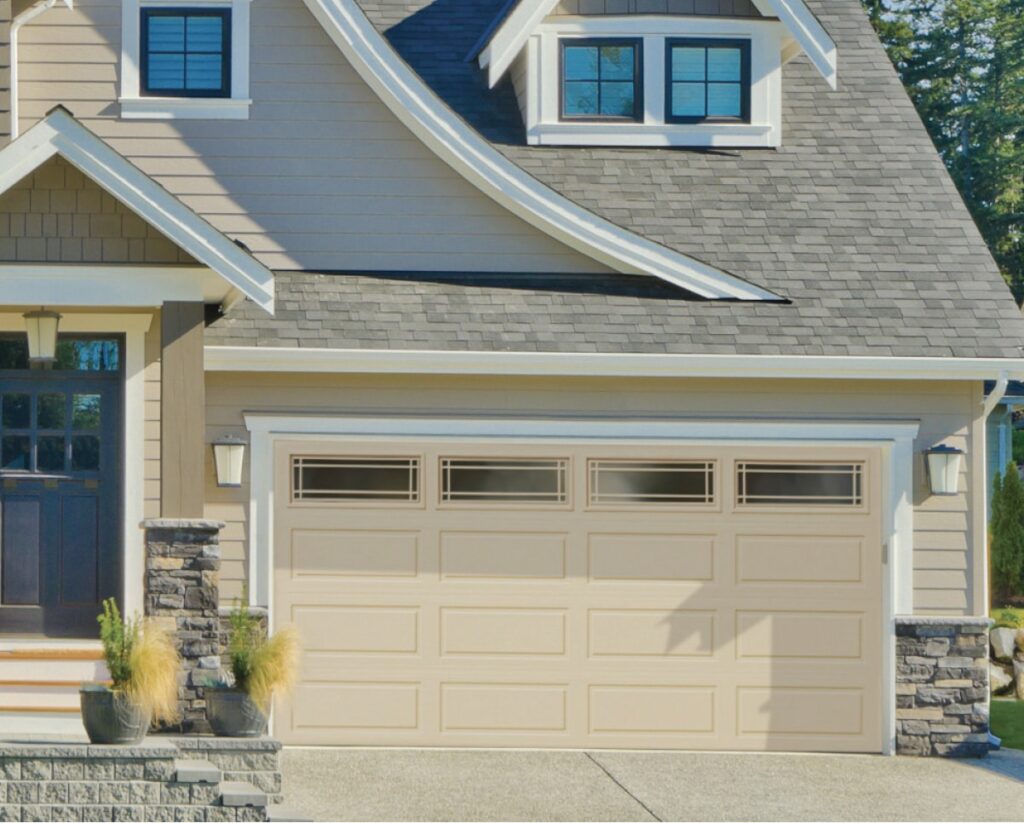 front house with light yellow garage door