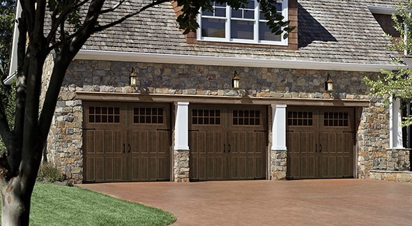 three brown garage doors | garage repair near me | Rose Quality