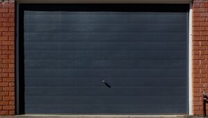 grey-garage-door-on-red-brick-wall