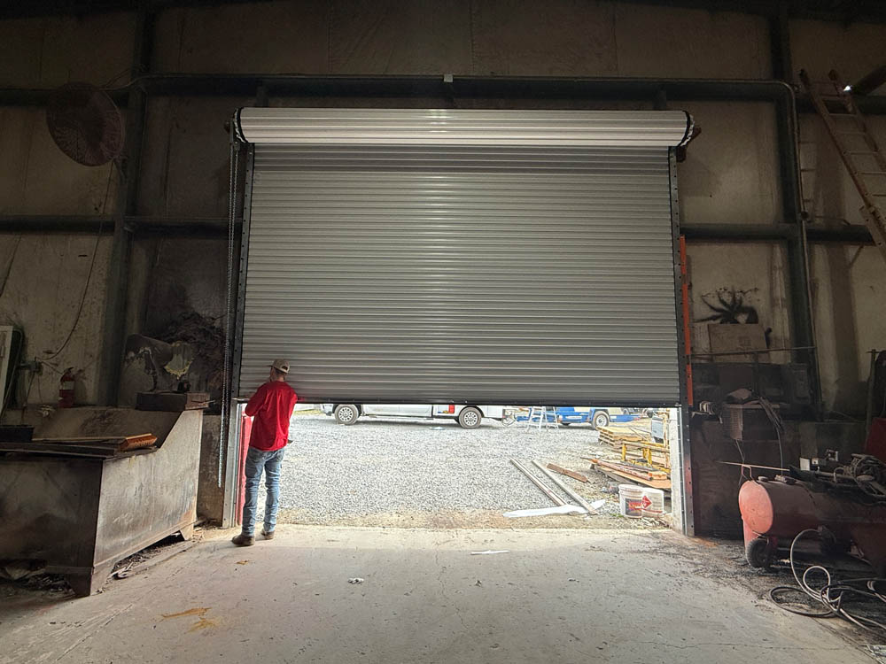 Image of Modern White Commercial Sheet Garage Doors by Rose Quality Garage Doors Serving Murfreesboro, Nashville, Knoxville, Clarksville, and Franklin, TN locations.
