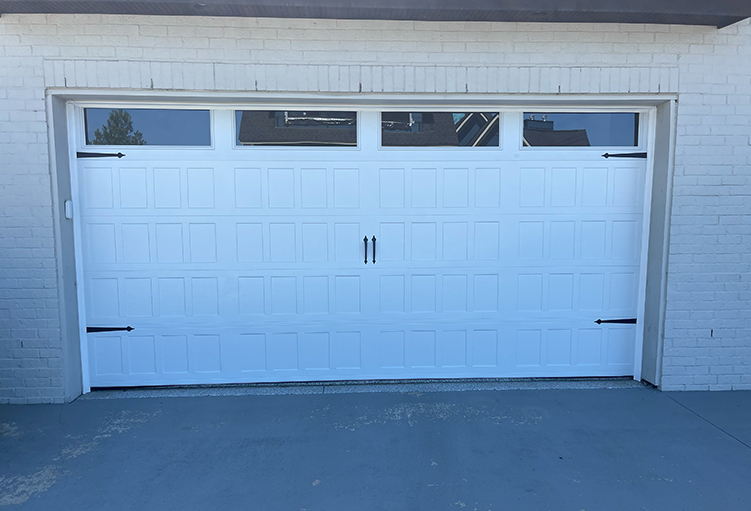 White Carriage Garage Doors by Rose Quality Garage Doors Serving Murfreesboro, Nashville, Knoxville, Clarksville, and Franklin, TN locations.