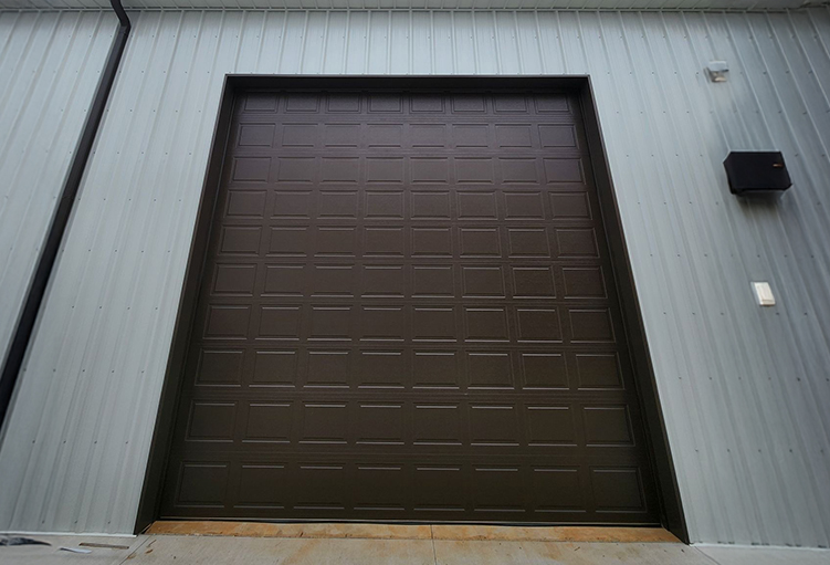 Image of Modern Brown Commercial Garage Doors by Rose Quality Garage Doors Serving Murfreesboro, Nashville, Knoxville, Clarksville, and Franklin, TN locations.