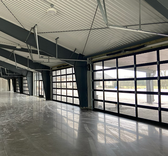 Image of Modern Full-View Glass Garage Doors by Rose Quality Garage Doors Serving Murfreesboro, Nashville, Knoxville, Clarksville, and Franklin, TN locations.