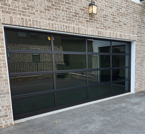Image of Modern Full-View Glass Garage Doors by Rose Quality Garage Doors Serving Murfreesboro, Nashville, Knoxville, Clarksville, and Franklin, TN locations.